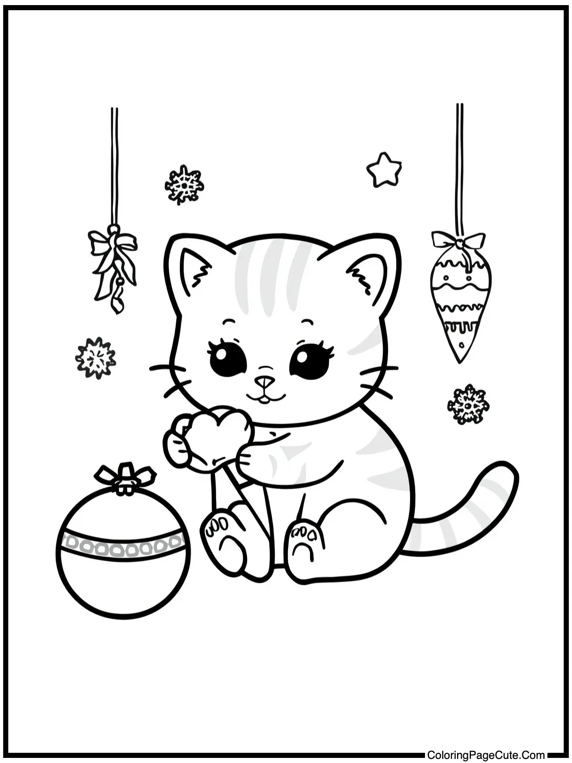 kitten playing with ornaments